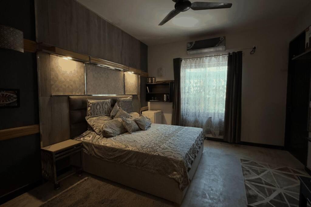 רוואלפינדי Greenlux Residency חדר תמונה